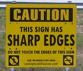 caution: this sign has sharp edges - funny picture!